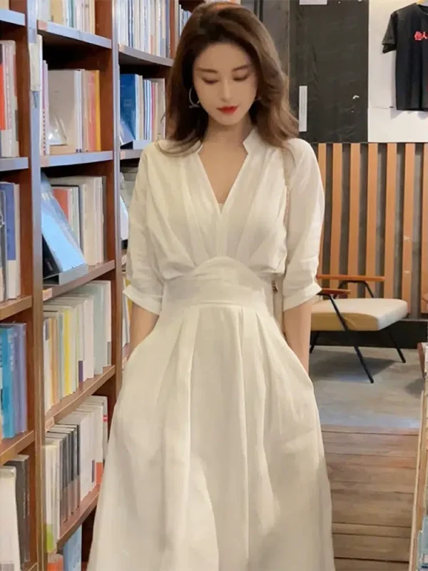 French white waist-cinching temperament dress for women 2024 new summer V-neck tea break long high-end fairy skirt