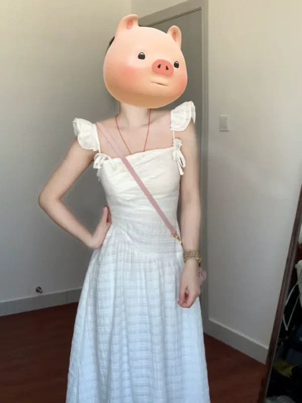 Tea break French white suspender dress for women 2024 new summer seaside vacation long dress with small flying sleeves