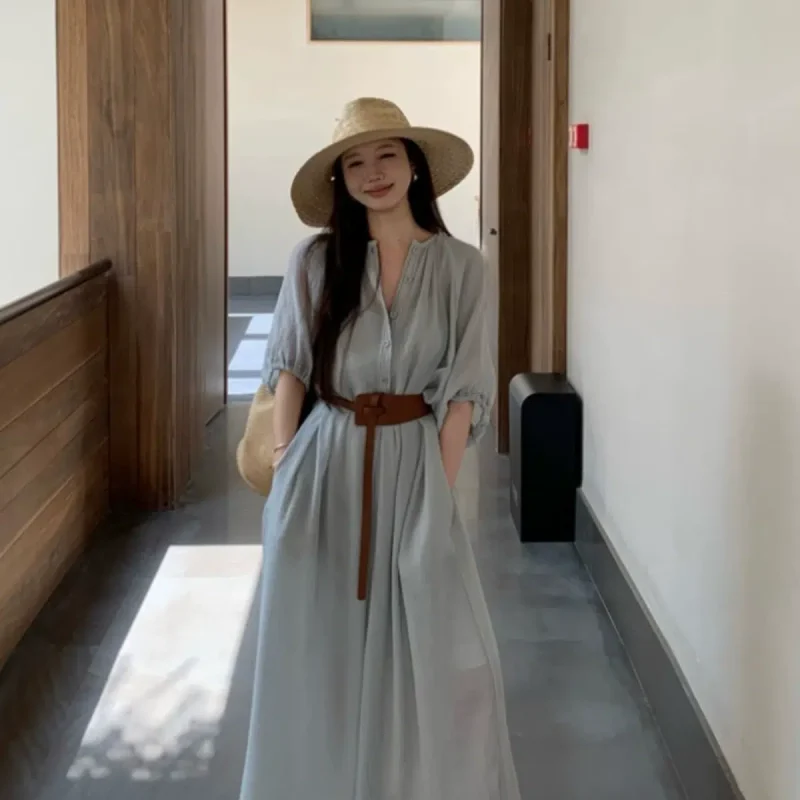 Vacation style half-sleeved dress for women in summer. Loose, slimming and flesh-covering skirt. Designed with niche temperament. A-line long skirt.