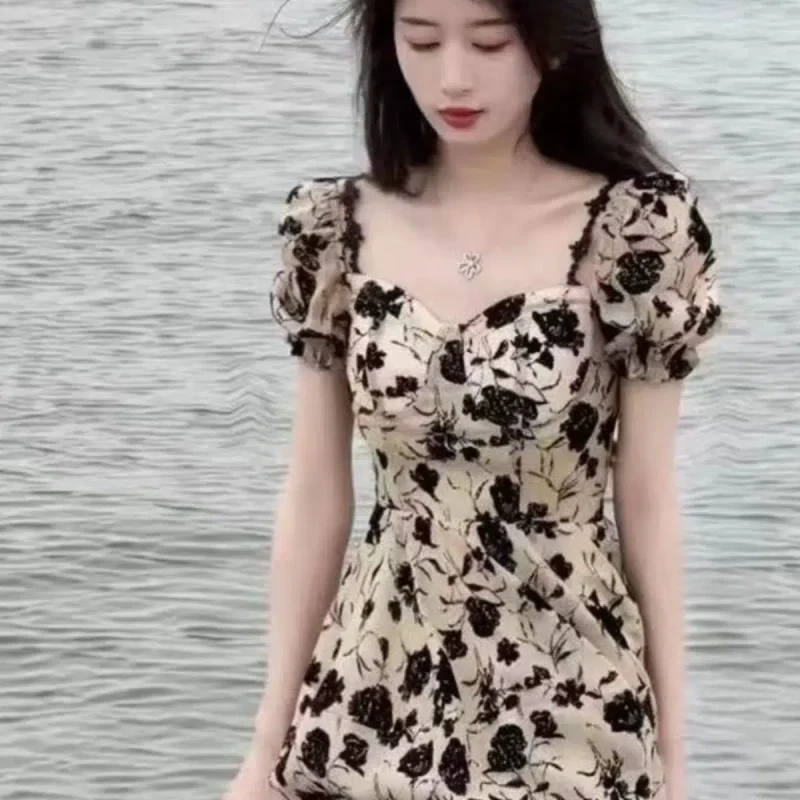 Summer women's clothing 2024 new high-end Platycodon tea break French black floral dress fairy long skirt